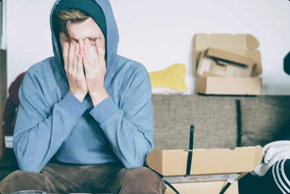 young-man-who-is-worried-with-face-in-his-hands Young man who is worried with his face in his hands